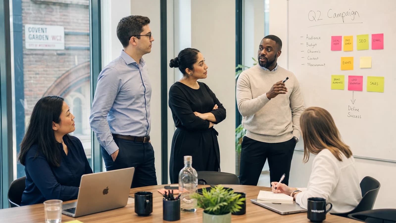 Ecommerce developers reviewing online store roadmap in London office